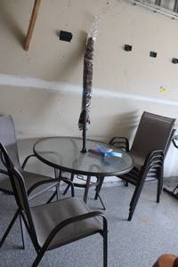 lot B-292 image: Outdoor Patio Set with Glass Table, 6 Chairs and Patio Umbrella