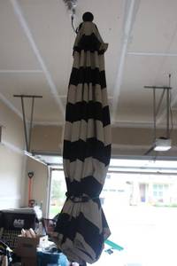 lot 352 image: Outdoor Patio Umbrella with Heavy Stand and New Cover