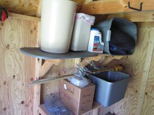 lot 231 image: Totes, tiki torches, barbed wire, i...