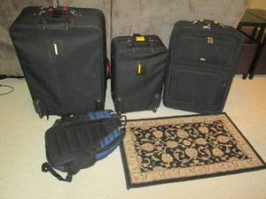 lot 26 image: Nice luggage and an Adidas backpack...