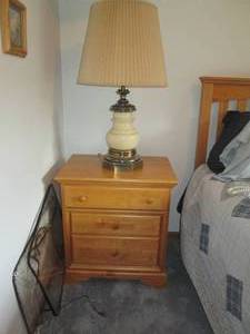 lot 92 image: Light wood 3 drawer nightstand with...