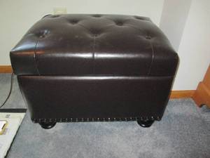 lot 96 image: A black leather type storage trunk ...