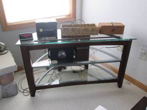 lot 100 image: Small glass tv stand with contents...