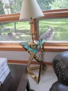 lot 109 image: Abstract triangular brass tone end ...