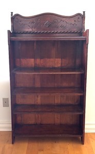 lot 15 image: Vintage Wooden Bookshelf with Carved Decorative Back Panel