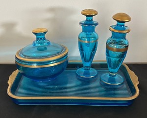 lot 46 image: Antique Blue Glass Vanity Set with Gold Trim on Tray by Diamond Glass Company