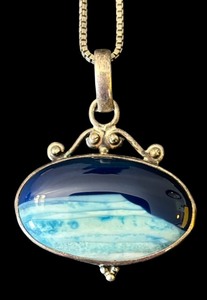 lot 85J image: Sterling Silver Wave Pendant Necklace with Blue Stone, 18 Inch Chain