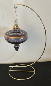 lot 106 image: 22 Karat Gold Accented Glass Ornament with Stand