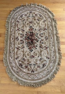 lot 133 image: Vintage Oval Area Rug with Floral Pattern and Fringe