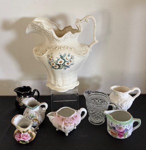 lot 135 image: Collection of 7 Vintage Decorative Pitchers including Large Floral Ceramic Piece
