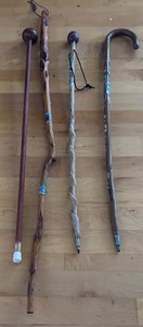 lot 178 image: Set of 4 Vintage Hiking and Walking Sticks with Souvenir Badges