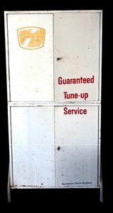 lot 326 image: Vintage Guaranteed Tune-up Service Metal Cabinet by Bonded Parts Company