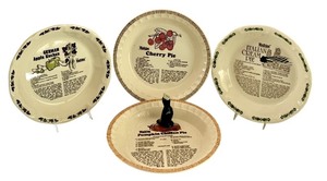 lot 218 image: Watkins Pie Plate Collection with Recipes and Ceramic Pie Bird