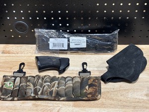 lot 52 image: Revolver Stock, Tactical Sling, Shell Belt, Pistol Holster