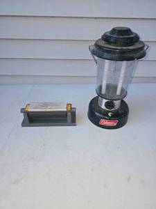 lot 34 image: battery lantern and knife sharpener