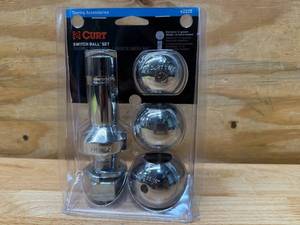 lot 112 image: CURT 42225 1-78, 2 and 2-516-Inch Chrome Steel Switch Ball Set