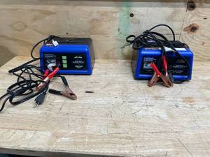 lot 96 image: Lot of 2 - CEN TECH 12v Analog and Manual Charger with Engine Start (Not Working) (082525110)