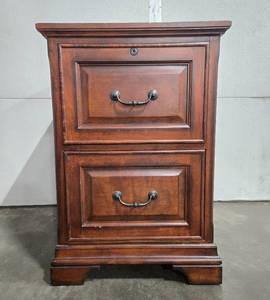 lot 5 image: Classic Two-Drawer Wood Filing Cabinet with Handles