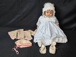 lot 46 image: Vintage Baby Doll with Blue Dress and Extra Handmade Outfits