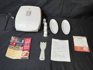 lot 58 image: George Foreman Lean Mean Fat Reducing Grilling Machine with Accessories