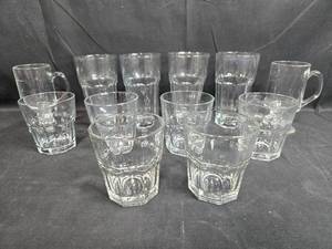 lot 72 image: Set of Assorted Clear Glass Drinking Glasses and Mugs