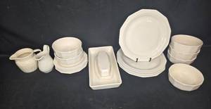 lot 81 image: Pfaltzgraff White Stoneware Dinnerware Set with Plates, Bowls, Pitchers, and Butter Dish