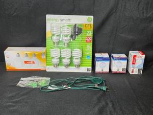 lot 94 image: Assorted Light Bulbs and Accessories Lot with Extension Cord and Button Cell Batteries