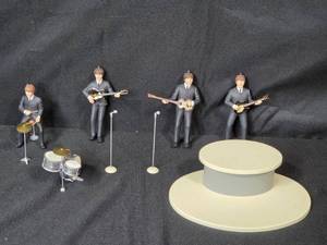 lot 100 image: Hallmark Ornament Beatles Band Figure Set with Instruments and Stage Display - Orig Box Inc but Not Pictured Retailed for $48