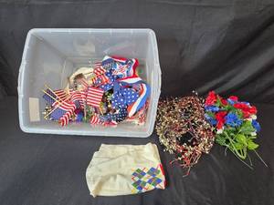 lot 106 image: Patriotic Decor Collection with Flags Garlands and Artificial Flowers