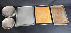 lot 125 image: Collection of Baking Sheets, Round Cake Pans, and Wood Cutting Board