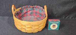 lot 156 image: Longaberger Handwoven Basket with Plaid Liner and 2000 Merry Christmas Accessory