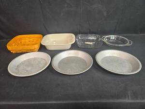 lot 205 image: Assorted Bakeware Lot with Pie Pans, Casserole Dishes, and Woven Basket
