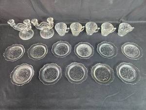 lot 221 image: Vintage Clear Depression Glass Serving Set with Floral Design - Plates, Cups, and Candle Holders - Iris