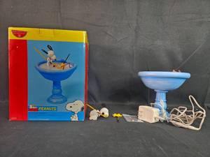lot 224 image: Department 56 Peanuts Lets Play Hockey Animated Display with Box - untested