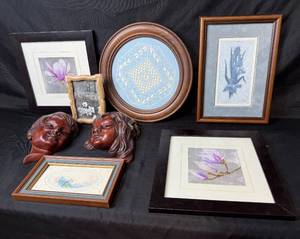 lot 245 image: Collection of Framed Artworks and Wall Decor Including Carved Faces and Floral Prints