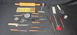lot 306 image: Vintage Kitchen Utensils Collection with Knives, Rolling Pin, and Fondue Forks