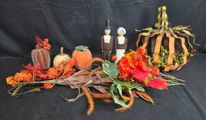 lot 321 image: Thanksgiving Fall Decor Collection with Pilgrim Figures, Pumpkins, and Floral Arrangements