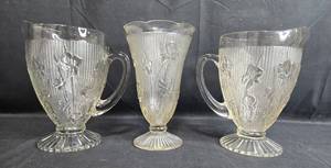 lot 334 image: Set of Vintage Depression Glass Pitchers and Vase with Embossed Floral Pattern - Iris