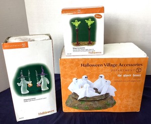 lot 23 image: Trio of Dept. 56 Halloween The Ghost Dance, Bubble Light Ghosts and Ghostly Glow Street Lights