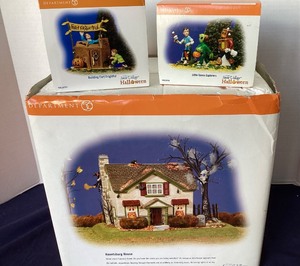 lot 31 image: Dept. 56 Halloween Hauntsburg House, Building Fort Frightful and Little Space Explorers