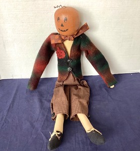lot 85 image: Folk Art Pumpkin Head Doll