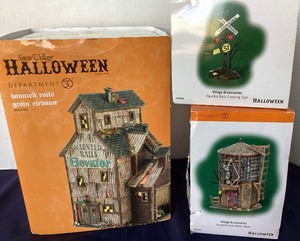 lot 122 image: Trio of Dept. 56 Halloween Haunted Rails Grain Elevator Haunted Rails Water Tower and Haunted Rails Crossing Sign