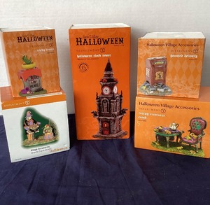 lot 185 image: Dept. 56 Halloween Group Halloween Clock Tower, Haunted Delivery, Creepy Creatures Croak, Tricky Treats and Ghastly Organ Grinder