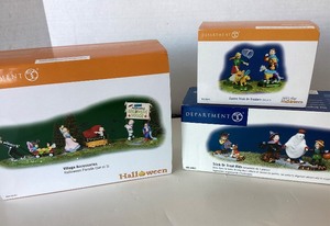 lot 256 image: Dept. 56 Halloween Trick or Treat Kids, Halloween Parade and Canine Trick or Treaters