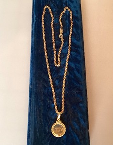 lot 74 image: 14K Gold Rope Necklace With Gold Nugget Locket