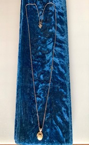 lot 70 image: Pearl and 14K White Gold Pendant on Silver Chain
