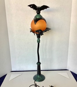 lot 129 image: Batty Orange Globe Lamp