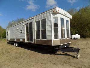 lot 1 image: 2007 Breckenridge Park Model Damon Series M-844-SB Triple Slide Camper  44 Length