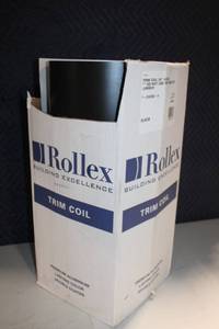 lot 32 image: Rollex 24 in x 50 ft Black Aluminum Trim Coil Roll