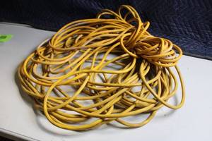 lot 53 image: Heavy Duty Yellow Outdoor Extension Cord Bundle